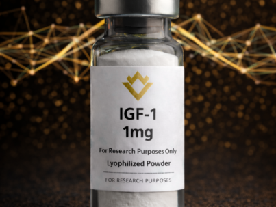 Vial labeled 'IGF-1 1mg' with a dark background